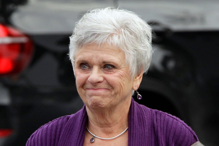 Dottie Sandusky, the wife of former Penn State University assistant football coach Jerry Sandusky, arrives Oct. 9, 2012, at the Centre County Courthouse in Bellefonte, Pa., for the sentencing of her husband, who was convicted in June of sexually abusing 10 boys in a scandal that rocked the university and brought down Hall of Fame coach Joe Paterno. (Associated Press)