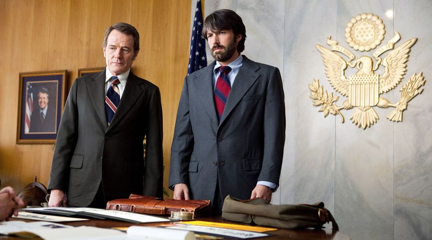 This film image released by Warner Bros. Pictures shows Bryan Cranston, left, as Jack O'Donnell and Ben Affleck as Tony Mendez in "Argo," a rescue thriller about the 1979 Iranian hostage crisis. (AP Photo/Warner Bros., Claire Folger)