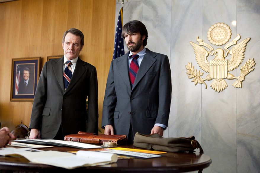 This film image released by Warner Bros. Pictures shows Bryan Cranston, left, as Jack OíDonnell and Ben Affleck as Tony Mendez in "Argo," a rescue thriller about the 1979 Iranian hostage crisis. (AP Photo/Warner Bros., Claire Folger)