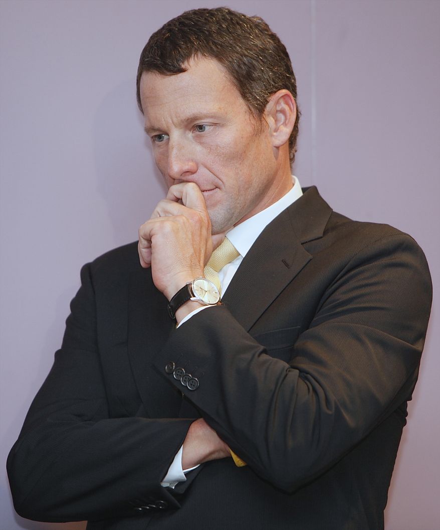 FILE - This Feb. 28, 2011 file photo shows Lance Armstrong listening to a fellow cancer survivor during a news conference in Los Angeles.. The world may soon know what the U.S. Anti-Doping Agency has on Armstrong. USADA has said it had 10 former teammates ready to testify against Armstrong before he chose not to take his case to an arbitration hearing. The list likely includes previous Armstrong accusers Floyd Landis and Tyler Hamilton. (AP Photo/Damian Dovarganes, File)