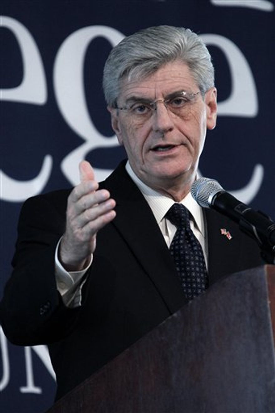Mississippi Gov. Phil Bryant outlines some current health care initiatives established by his administration in hopes that they will help with easing into the federal health care overhaul in the state at the the Mississippi Health Care Reform Summit at Mississippi College in Clinton, Miss., Wednesday, Oct. 10, 2012. The day long summit also dealt with the current status of employer provided health care as well specific upcoming changes and their effect on businesses. (AP Photo/Rogelio V. Solis)