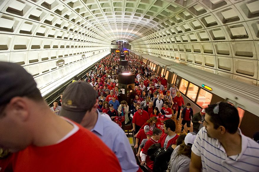 Washington Nationals fans crowd the platform at the Navy Yard station on their way to the ballpark for the first home game in the National League Division Series on Wednesday, Oct. 10, 2012. (Barbara L. Salisbury/The Washington Times)