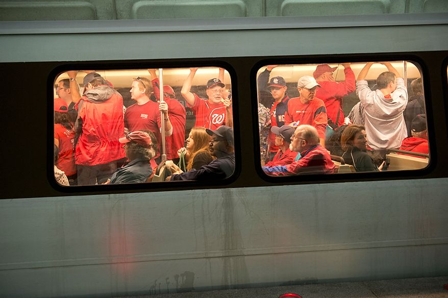 Nationals fans arrive via Metro at the Navy Yard station in Southeast Washington, D.C. for the first home game in the National League Division Series on Wednesday, Oct. 10, 2012. (Barbara L. Salisbury/The Washington Times) ** FILE **