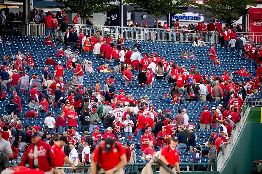 Fans leave the stadium after the Washington Nationals lose to the St. Louis Cardinals 8-0 in game three of the National League Division Series at Nationals Park, Washington, D.C., Wednesday, October 10, 2012. (Andrew Harnik/The Washington Times)