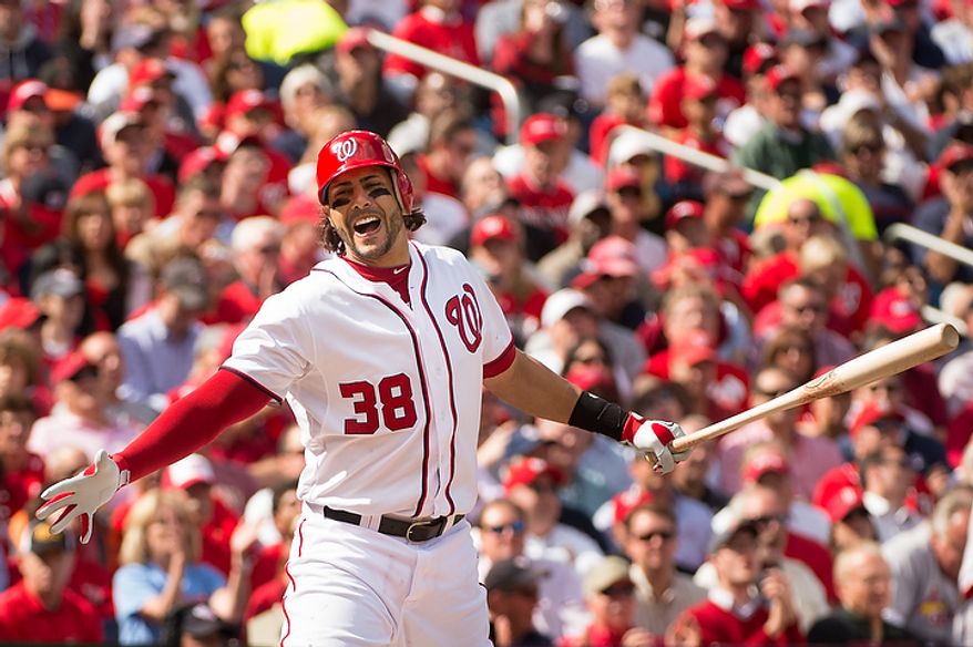 Washington Nationals left fielder Michael Morse (38) shows his frustration as he strikes out to end the first inning as the Washington Nationals play the St. Louis Cardinals in Game 3 of Major League Baseball's National League Division Series at Nationals Park, Washington, D.C., Wednesday, October 10, 2012. (Andrew Harnik/The Washington Times)