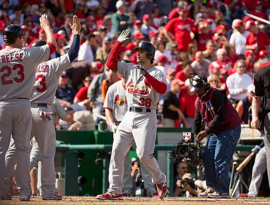 St. Louis Cardinals shortstop Pete Kozma (38) hits a three run homer in the second inning to put the St. Louis Cardinals up 4-0 as the Washington Nationals play the St. Louis Cardinals in game three of Major League Baseball playoffs at Nationals Park, Washington, D.C., Wednesday, October 10, 2012. (Andrew Harnik/The Washington Times)
