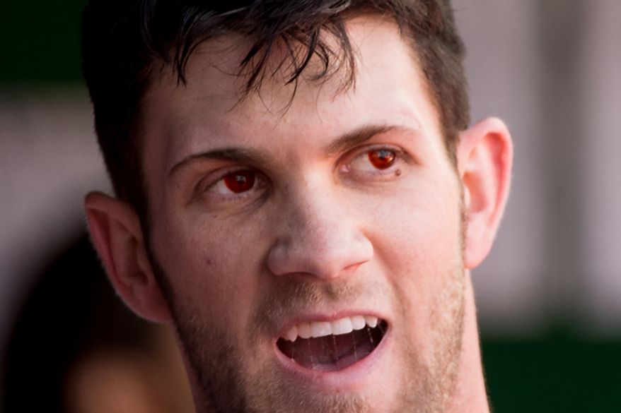 Washington Nationals center fielder Bryce Harper (34) wears red contacts as the Washington Nationals play the St. Louis Cardinals in game three of Major League Baseball playoffs at Nationals Park, Washington, D.C., Wednesday, October 10, 2012. (Andrew Harnik/The Washington Times)