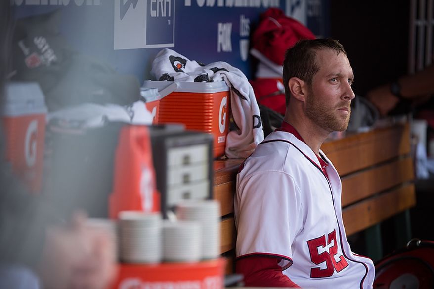 Washington Nationals relief pitcher Ryan Mattheus (52) sits in the dugout after giving up two runs in the eight inning as the Washington Nationals lose to the St. Louis Cardinals 8-0 in game three of the National League Division Series at Nationals Park, Washington, D.C., Wednesday, October 10, 2012. (Andrew Harnik/The Washington Times)