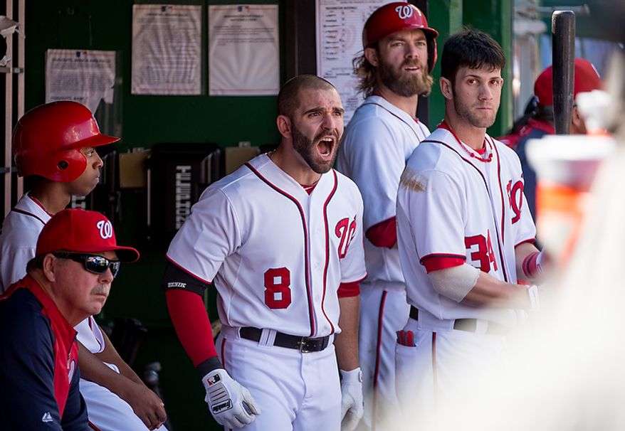 Washington Nationals second baseman Danny Espinosa (8) shows his frustration in the dugout as he was called out at first on a bunt in the second inning as the Washington Nationals play the St. Louis Cardinals in game three of Major League Baseball playoffs at Nationals Park, Washington, D.C., Wednesday, October 10, 2012. (Andrew Harnik/The Washington Times)