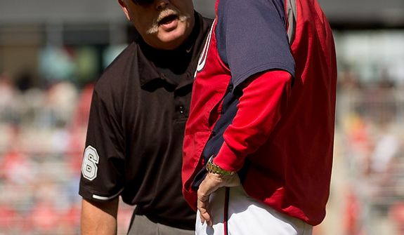 Washington Nationals manager Davey Johnson (5) argues a call with the first base umpire in the second inning as the Washington Nationals play the St. Louis Cardinals in game three of Major League Baseball playoffs at Nationals Park, Washington, D.C., Wednesday, October 10, 2012. (Andrew Harnik/The Washington Times)
