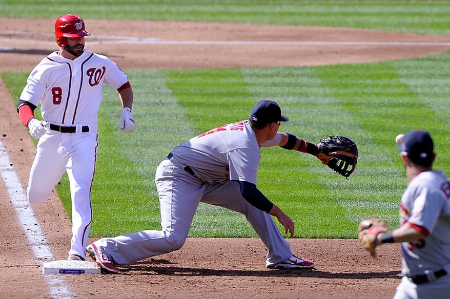 Despite beating the throw, Washington Nationals second baseman Danny Espinosa (8) is called out at first on a sacrifice bunt in the second inning in Game 3 of the National League Division Series at Nationals Park, Washington, D.C., Oct. 10, 2012. (Preston Keres/Special to The Washington Times)