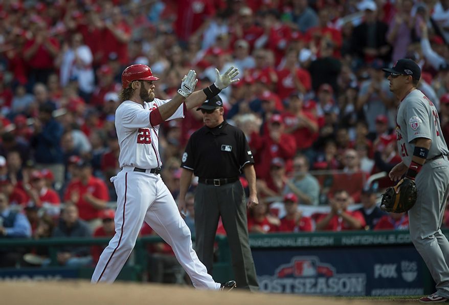 Nationals' Jayson Werth reacts to the National's first hit of the game, his single in the bottom of the first inning as the Washington Nationals host the St. Louis Cardinals for Game 3 of the National League Division Series at Nationals Park in Washington, D.C., Wednesday, Oct. 10, 2012. (Rod Lamkey Jr./The Washington Times)