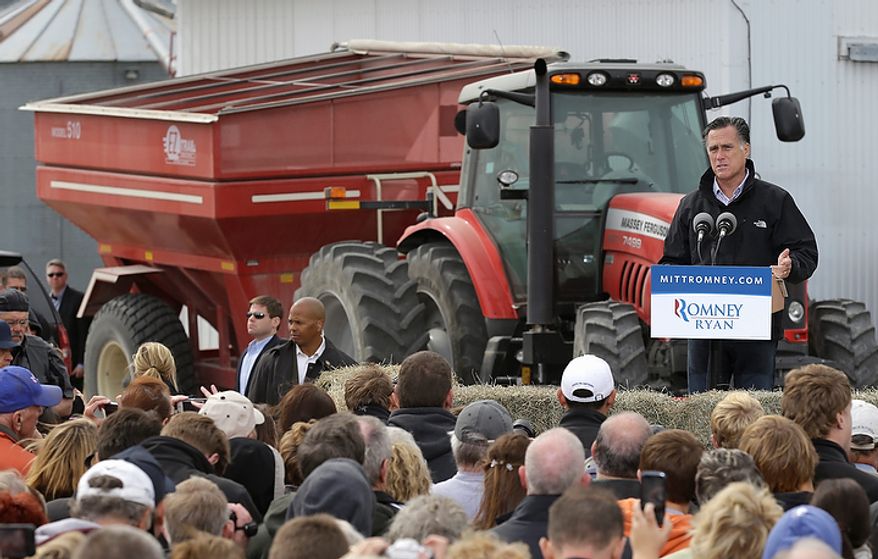 Republican presidential candidate Mitt Romney speaks during a campaign stop at the Koch family farm on Tuesday, Oct. 9, 2012, in Van Meter, Iowa. (AP Photo/Charlie Neibergall)