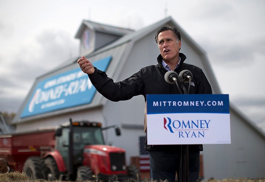 Republican presidential candidate Mitt Romney speaks during a campaign rally on Tuesday, Oct. 9, 2012, in Van Meter, Iowa. (AP Photo/Evan Vucci)