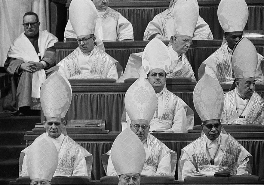 Cardinals seated in St. Peter's Basilica as they attend the solemn opening ceremony of the second session of the Ecumenical Council , Sept. 29, 1963. Top row, left to right: Cardinal Jose Humberto Quintero, Archbishop of Caracas; Cardinal Joseph Elmer Ritter, Archbishop of Saint Louis, Missouri; Cardinal Laurean Rugambwa, Bishop of Bukoba, Tanganyika. Middle row: Cardinal Julius Doepfner of Munich And Freisling; Cardinal Jose M. Bueno y Monreal, Archbishop of Seville. Bottom row: Cardinal Paul Emile Leger, Archbishop of Montreal; Cardinal Giuseppe Ferretto, Italian member of the Vatican Curia; and Cardinal Valerian Gracias, Archbishop of Bombay, India. (AP Photo)