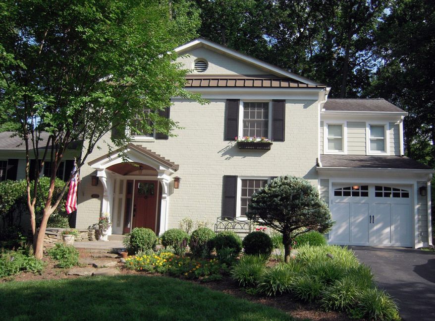 Rick Matus of Case Design/Remodeling in Bethesda recommends a portico entrance on homes with a flat front to define the entrance give the home presence.