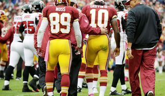 Redskins quarterback Robert Griffin III (10) experienced no setbacks Thursday as he continued his recovery from a concussion suffered Sunday in Washington’s loss to the Atlanta Falcons. (Associated Press)