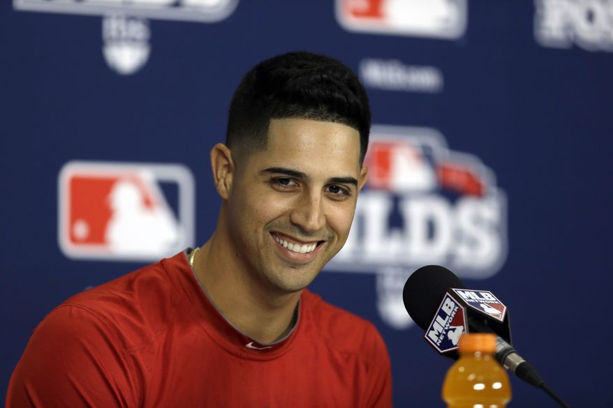 Nationals lefty Gio Gonzalez sports his new haircut done by Hugo Tandron at a National League Division Series press conference. (AP Photo/Jeff Roberson)