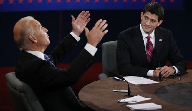 Vice President Joe Biden and Republican vice presidential nominee Rep. Paul Ryan of Wisconsin participate in the vice presidential debate at Centre College, Thursday, Oct. 11, 2012, in Danville, Ky. (AP Photo/Pool-Rick Wilking)