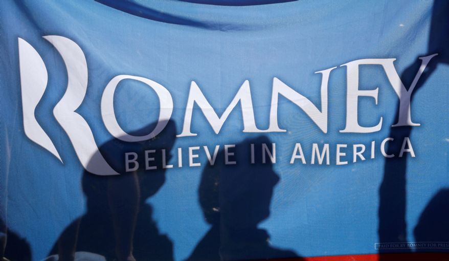 Supporters wave signs during a rally outside the Norton Center on the Centre College campus in Danville, Ky., before the vice presidential debate on Oct. 11, 2012. Vice President Joseph R. Biden will face Republican vice presidential candidate Paul Ryan. (Associated Press)