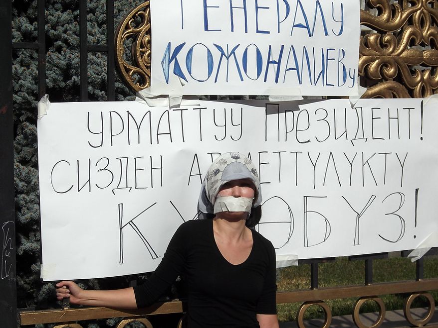 Daniya Kozhonaliyev, daugther of former military prosecutor Kubatbek Kozhonaliyev who was arrested last week in connection with protests that the Kyrgz government have branded at attempted coup, on hunger strike outside the White House government building in Bishkek. October 10, 2012. (Mattia Beggi/Special to The Washington Times)