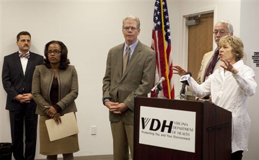 Dr. Molly O'Dell, right, health director of the New River Valley Health District, addresses a press conference on Friday, Oct. 5, 2012 in Roanoke, Va., concerning the recent fungal menigitis outbreak investigation tied to tainted injections. Other health care officials participating are, from the left; LewisGale Regional Health System CEO Victor Giovanetti, Director of the Roanoke-Alleghany Health Department Dr. Stephanie Harper, Chief Medical Officer for LewisGale Regional Health System Dr. Gary Winfield, Dr. Thomas Kerkering, Infectious Disease, Carilion Clinic. Public health officials in Virginia say the number of suspected cases of a rare and potentially deadly outbreak of meningitis has increased to five. The state has recorded one death linked to a fungal meningitis outbreak.(AP Photo/The Roanoke Times, Stephanie Klein-Davis)