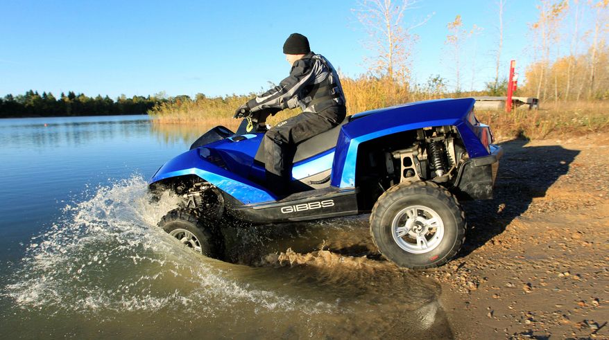 In this Friday, Oct. 12, 2012 photo, the Quadski, a one-person motor boat that also drives on land, is tested in in Oxford Mich. The vehicle is being billed as the first commercially available, high-speed amphibious vehicle by its makers, Michigan-based Gibbs Technologies. It's scheduled to go on sale in the U.S. by the end of this year for around $40,000. The company hopes to sell it worldwide by 2014. (AP Photo/Carlos Osorio)