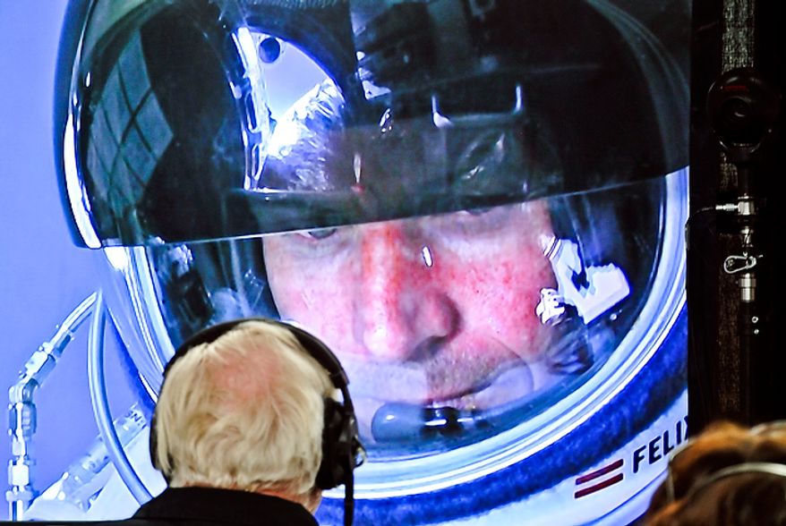In this photo provided by Red Bull, pilot Felix Baumgartner of Austria is seen in a screen at mission control center in the capsule during the final manned flight for Red Bull Stratos in Roswell, N.M. on Oct. 14, 2012. Baumgartner plans to jump from an altitude of 120,000 feet, an altitude chosen to enable him to achieve Mach 1 in free fall, which would deliver scientific data to the aerospace community about human survival from high altitudes. (Associated Press/Red Bull)