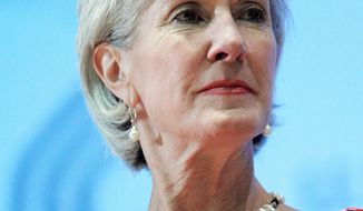 Health and Human Services Secretary Kathleen Sebelius says she made an “inadvertent error” when, on an official trip earlier this year, she urged an audience to vote of President Obama. (Associated Press)