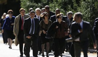 Mourners walk Oct. 16, 2012, to Har Zion Temple in Penn Valley, Pa., for former U.S. Sen. Arlen Specter&#39;s funeral. Family members say Specter died Sunday of complications from non-Hodgkin lymphoma. He was 82. (Associated Press)