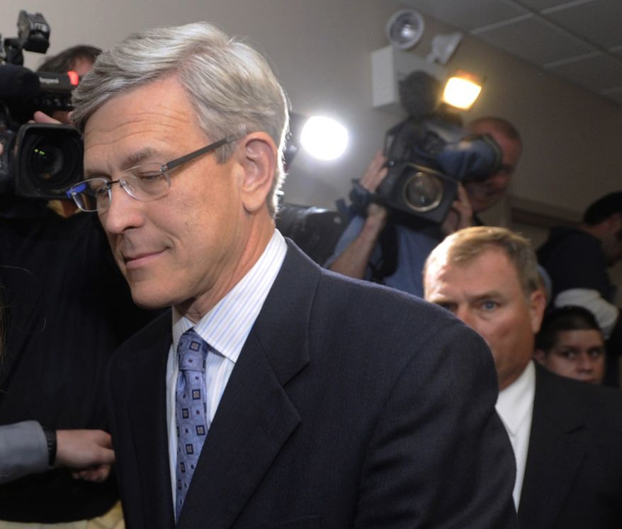 FILE - This Nov. 7, 2011 file photo shows former Penn State athletic director Tim Curley, left, and former Penn State Vice President Gary Schultz, right, entering a district judge's office for an arraignment in Harrisburg, Pa. Penn State will not renew the contract of athletic director Curley, who has been on leave since being charged last year with perjury and failing to report a child sex abuse allegation against Jerry Sandusky. (AP Photo/Bradley C. Bower, File)