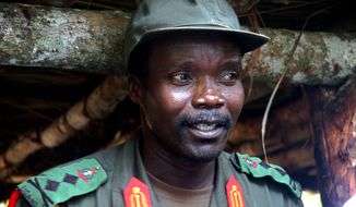 **FILE** Joseph Kony, leader of the Lord&#39;s Resistance Army, meets July 31, 2006, with a delegation of 160 officials and lawmakers from northern Uganda and representatives of non-governmental organizations in Congo near the Sudan border. (Associated Press)