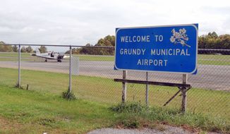 The runway at Grundy Municipal Airport in Virginia coal country is 2,200 feet long. Efforts to lengthen it to 5,700 feet to accommodate larger aircraft have been stymied by federal red tape. (Debra McCown/Special to The Washington Times)