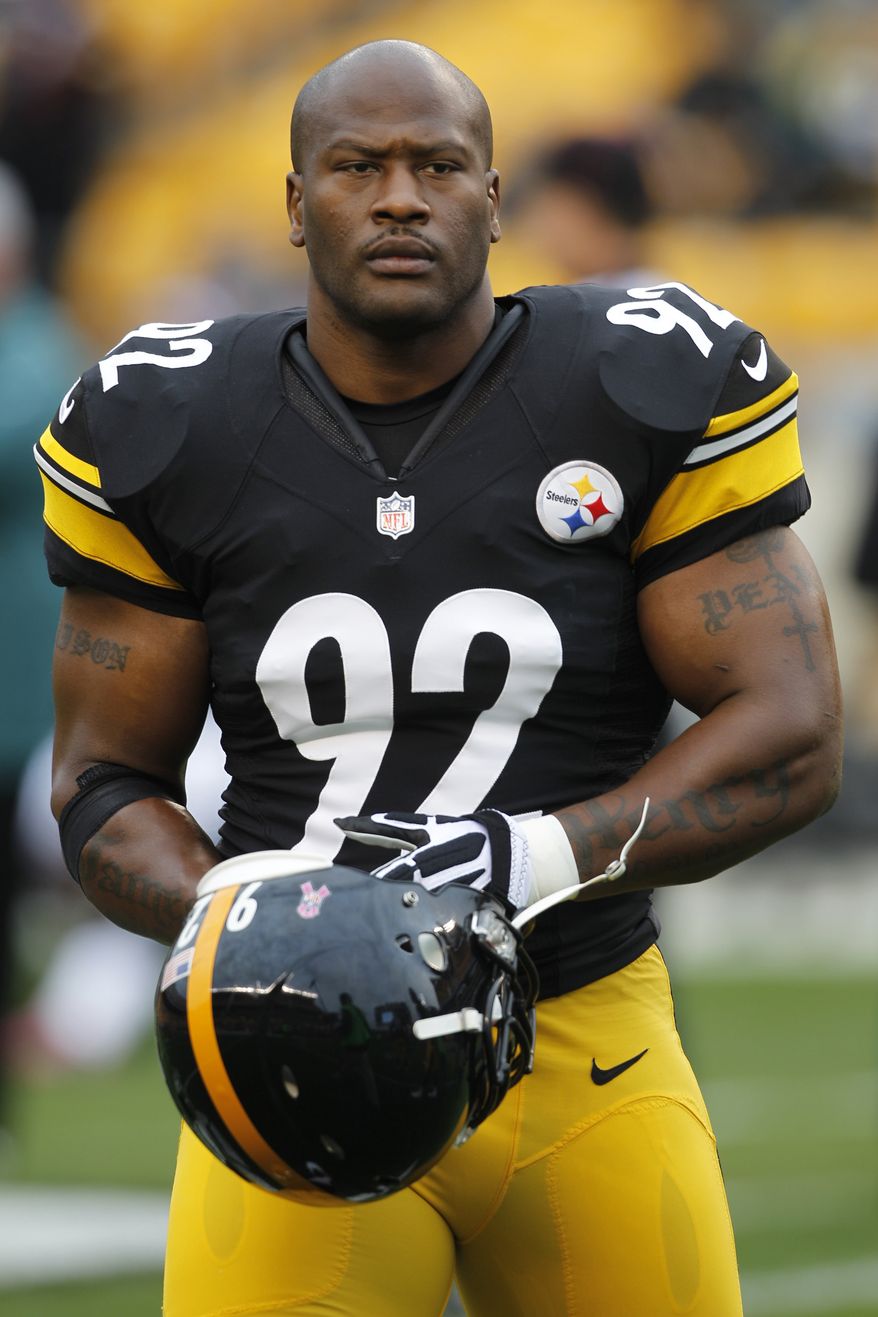 Pittsburgh Steelers linebacker James Harrison (92) warms up before an NFL football game against the Philadelphia Eagles on Sunday, Oct. 7, 2012 in Pittsburgh. This is the first game of the season Harrison is expected to play in. (AP Photo/Keith Srakocic)