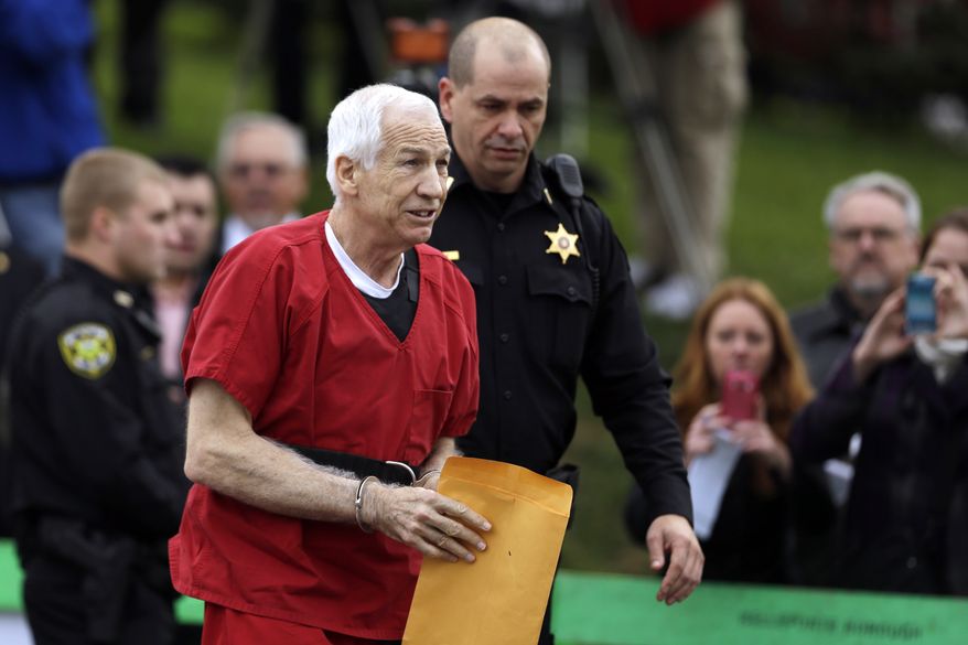 Former Penn State University assistant football coach Jerry Sandusky arrives at the Centre County Courthouse for a sentencing hearing Tuesday, Oct. 9, 2012, in Bellefonte, Pa. Sandusky was convicted of sexually abusing 10 boys in a scandal that rocked the university and brought down Hall of Fame coach Joe Paterno. (AP Photo/Matt Rourke)