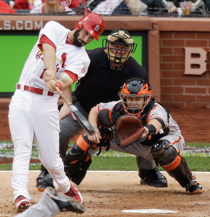 5St. Louis Cardinals' Matt Carpenter (13) hits a two-run home run during the third inning of Game 3 of baseball's National League championship series against the San Francisco Giants, Wednesday, Oct. 17, 2012, in St. Louis. (AP Photo/Mark Humphrey)