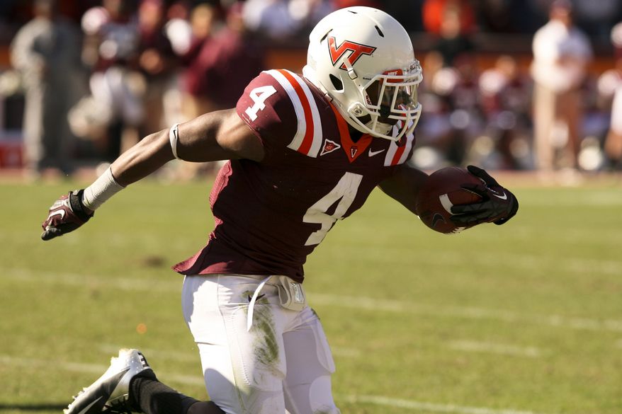 J. C. Coleman (4) breaks for an 86 yard touchdown run in the fourth quarter of an NCAA college football game against Duke in Blacksburg Va. Saturday Oct. 13, 2012. Virginia Tech won 41-20. (AP Photo / The Roanoke Times, Matt Gentry)