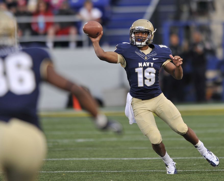 Navy quarterback Keenan Reynolds passes against Indiana during the second half of an NCAA college football game on Saturday, Oct. 20, 2012, in Annapolis, Md. Navy won 31-10. (AP Photo/Gail Burton)