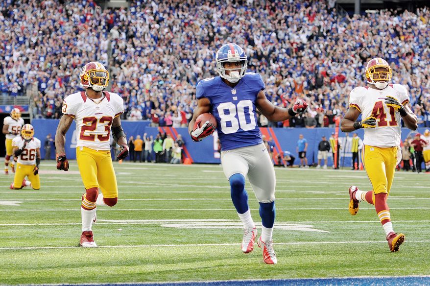 New York Giants wide receiver Victor Cruz (80) scores the game-winning touchdown on a 77-yard reception late in the game at MetLife Stadium, East Rutherford, N.J., Oct. 21, 2012. (Preston Keres/Special to The Washington Times)