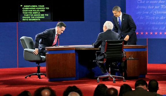 Moderator Bob Schieffer, center, watches as Republican presidential candidate, former Massachusetts Gov. Mitt Romney and President Barack Obama take their seats before the start of the last debate. (AP Photo/Pablo Martinez Monsivais)