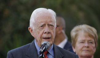 ** FILE ** Former President Jimmy Carter speaks Oct. 22, 2012, in the West Bank city of Ramallah to the media following a meeting with Palestinian President Mahmoud Abbas. (Associated Press)