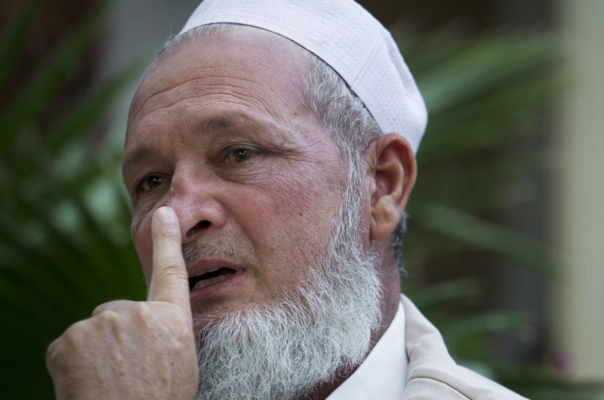 On Wednesday, Oct. 17, 2012, Haji Zahid Khan, a member of a major tribal council in Mingora, Pakistan, in the Swat Valley, shows where a bullet struck his nose in Mingora, Swat Valley, Pakistan. A Taliban gunman shot him as he was heading to a local mosque in August, but he managed to survive, even though the bullet tore through his neck and exited at the front of his face. (AP Photo/B.K. Bangash)