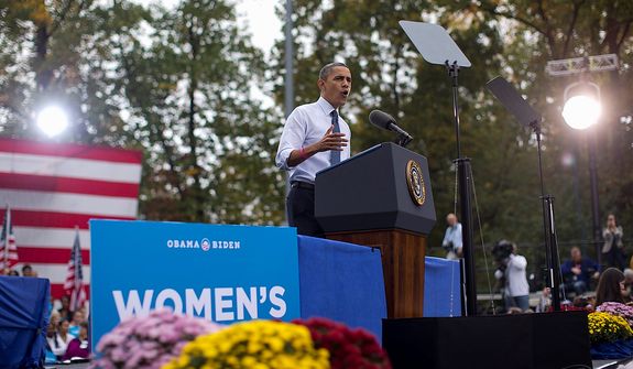 President Barack Obama speaks about the choice facing women in the upcoming election, Friday, Oct. 19, 2012, at a campaign event at George Mason University in Fairfax, Va. (AP Photo/Carolyn Kaster)