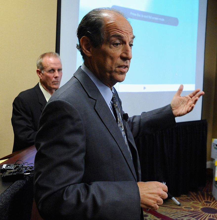 Portland attorney Paul Mones (right), with Kelly Clark, talks at a Oct., 18, 2012, press conference in Portland, Ore., about some of the 14,500 pages of previously confidential documents created by the Boy Scouts of America concerning child sexual abuse within the organization. The documents were publicly released despite The Boy Scouts' fight to keep those files confidential. (Associated Press)