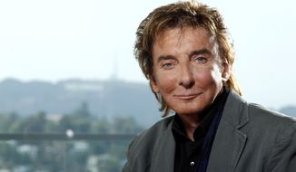 Musician Barry Manilow poses for a portrait in Los Angeles in June 2011. The singer-songwriter will be back on Broadway in January for a limited engagement. (AP Photo/Matt Sayles)