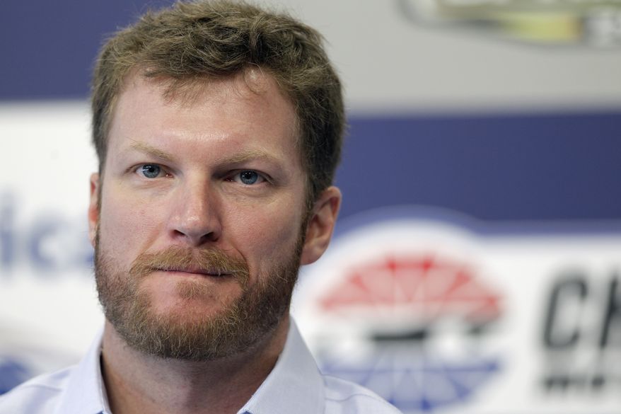 Dale Earnhardt Jr. pauses as he talks about missing the next two races with his second concussion in the past six weeks  during a news conference prior to practice for Saturday&#x27;s NASCAR Bank of America 500 NASCAR Sprint Cup series auto race in Concord, N.C., Thursday, Oct. 11, 2012. (AP Photo/Chuck Burton)