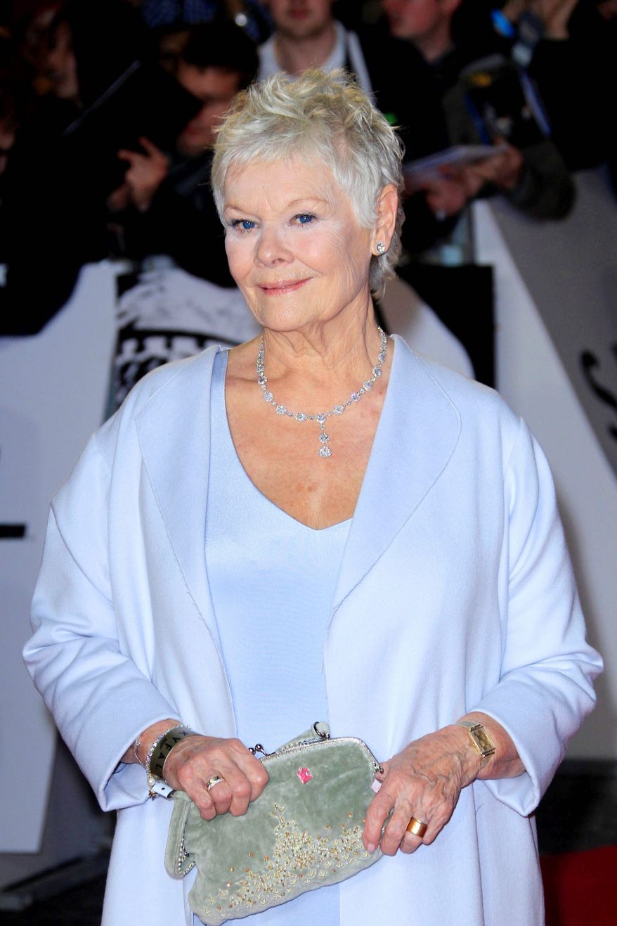Dame Judi Dench arrives at the world premiere of "Skyfall" at the Royal Albert Hall on Tuesday, Oct. 23, 2012 in London. (Photo by Joel Ryan/Invision/AP)