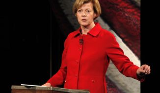 Democratic candidate for Wisconsin&#39;s U.S. Senate seat, U.S. Rep. Tammy Baldwin, participates in a debate against Republican candidate former Gov. Tommy Thompson held at the Wisconsin Institute for Public Policy and Service on the University of Wisconsin Marathon County campus in Wausau, Wis., Thursday, Oct. 18, 2012. (AP Photo/Milwaukee Journal Sentinel, Gary Porter, Pool)