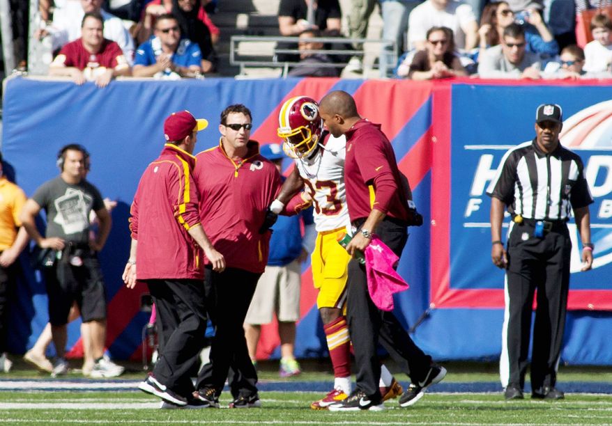 Losing tight end Fred Davis for the season to an Achilles injury is a blow, but the offense should be able to keep functioning at a high level because of the way the Redskins spread the ball around. (Craig Bisacre/The Washington Times)