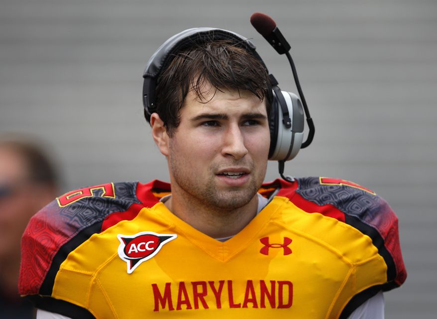 Maryland quarterback C.J. Brown tore his ACL in August, but he's still been a constant around the team, trying to help out where he can. (AP Photo/Patrick Semansky)